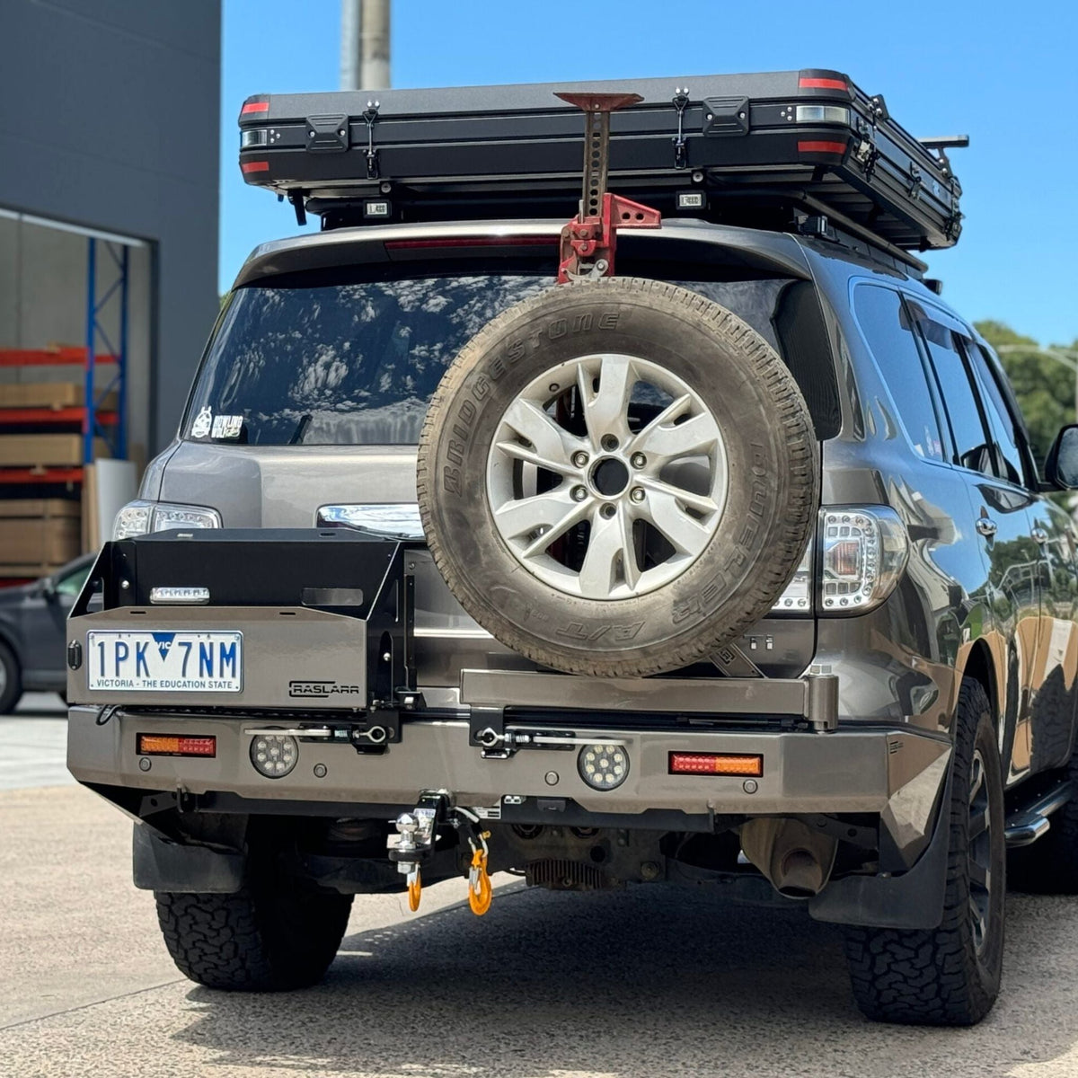 Rear Bar Hi Lift Jack [Sits between vehicle & carrier] - Y62 Patrol S4-5